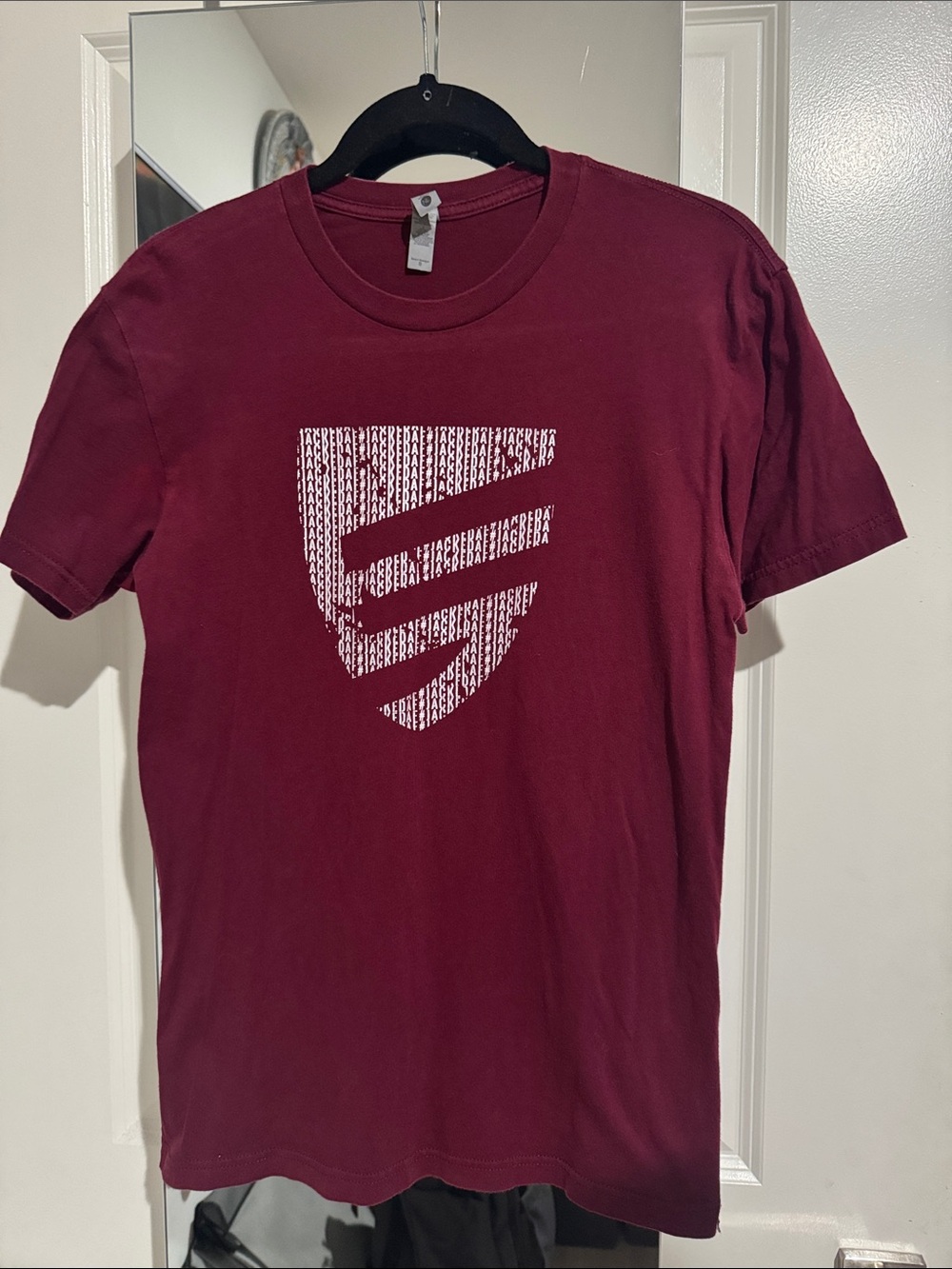 Next Level Apparel Burgundy Short Sleeve Tee with White Shield Graphic
